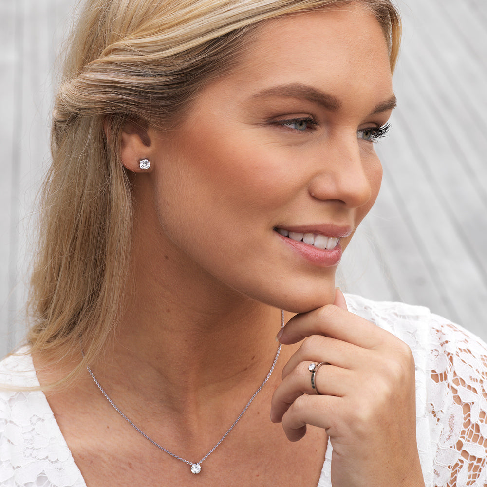 Woman wearing Silver Cubic Zirconia Necklace - silver post jewelry - necklaces for women, kids and girls
