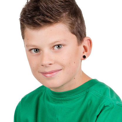 Boy modelling unisex black titanium hypoallergenic puck ear studs