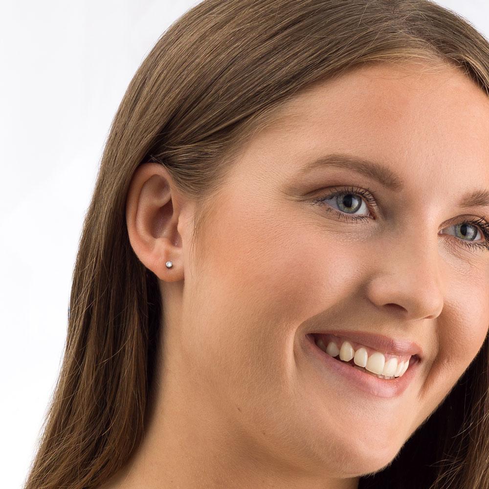 crystal bezel studs - silver titanium post jewelry - earrings for women, kids and girls - 3mm - model close up 