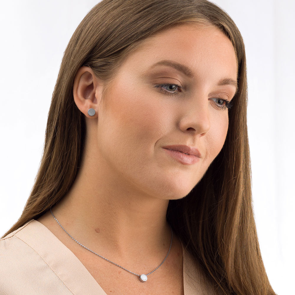Woman wearing Silver Brilliance Puck Crystal Jewellery set