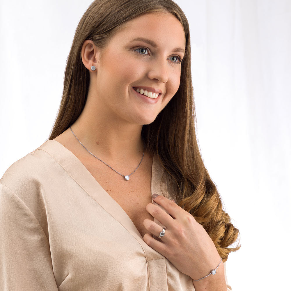 Woman wearing Silver Brilliance Puck Crystal Jewellery set